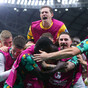Australia qualify for World Cup knockouts for second time, as Denmark suffer shock exit