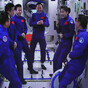 Chinese astronauts return to Earth after six-month mission