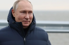 Putin drives across repaired bridge to Crimea in bid to boost Russian morale