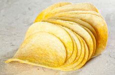 Woman perforates palate while eating a Pringle at Christmas