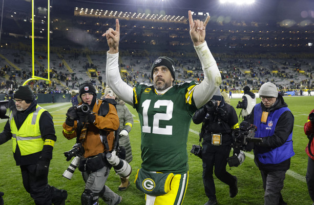 Aaron Rodgers throws for 229 yards and a touchdown as Green Bay Packers  beat Rams to stay in playoff hunt