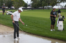 McIlroy's first round of the year interrupted as Dubai Desert Classic hit by deluge