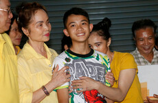 Ashes of boy rescued from Thai cave in 2018 arrive home after his death in the UK