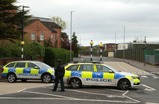 Man charged after car crashed into Belfast PSNI station yesterday