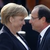 Hollande and Merkel buddy up for anniversary talks as Euro, EADS loom