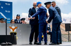 Joe Biden says he ‘got sandbagged’ after falling at military graduation event