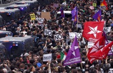Spanish police beat protesters after anti-austerity protest