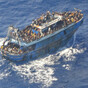 Nine men suspected of crewing migrant-smuggling ship that sank off Greece appear in court