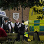 Eight-year-old girl killed and 10 in hospital after car crashes into school building in London