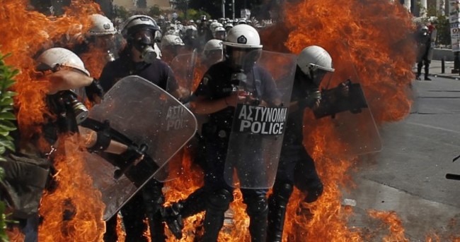 Pics: Petrol bombs thrown at Greek police during anti-austerity protests