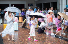 Hundreds of thousands evacuated in China and Vietnam as Typhoon Talim makes landfall