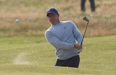McIlroy battles back from poor start to stay within reach at Open