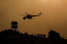 Resorts evacuated as blaze rages out of control on Greek island of Rhodes amid heatwave