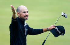 Brian Harman holds nerve in brutal conditions to win the Open Championship