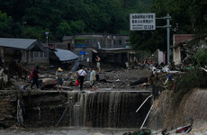 At least 11 dead in Beijing as heavy rain causes floods and forces evacuations
