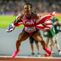'I'm back!' - Richardson takes world 100m gold