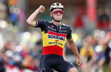 Evenepoel powers to Vuelta stage three win and takes red jersey