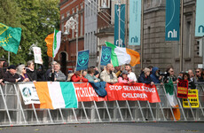 Who were the protesters at the Dáil and what exactly were they protesting?