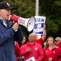 Biden becomes first US president to walk striking workers' picket line