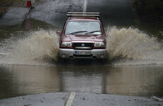 In pictures: Children carried from school during evacuation as floods hit south-east