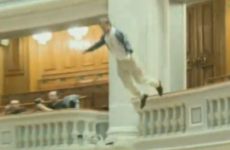 Romanian man throws himself off parliament balcony
