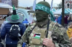 PSNI cast doubt on photo of man dressed as Palestinian militant walking through Derry