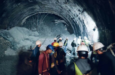 Rescuers trying to free 40 workers trapped under collapsed tunnel in India