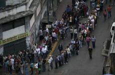 Poll open in Venezuela in tough election for Chavez