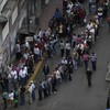 Poll open in Venezuela in tough election for Chavez