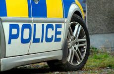 Police officer and pedestrian hit by vehicle while at scene of collision in Co Antrim