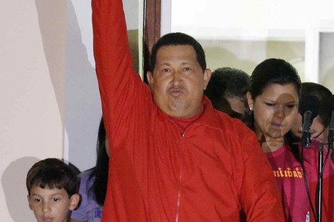  Chavez greets his supporters at the Miraflores presidential palace balcony in Caracas