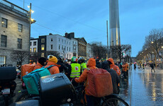 Food delivery drivers in Dublin take part in strike action and gather on O'Connell Street