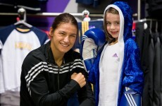 De la Hoya's pro offer tempts Katie, but her heart remains an amateur