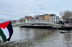 Pro-Palestinian campaigners line the Liffey in protest at White House St Patrick's Day ceremony