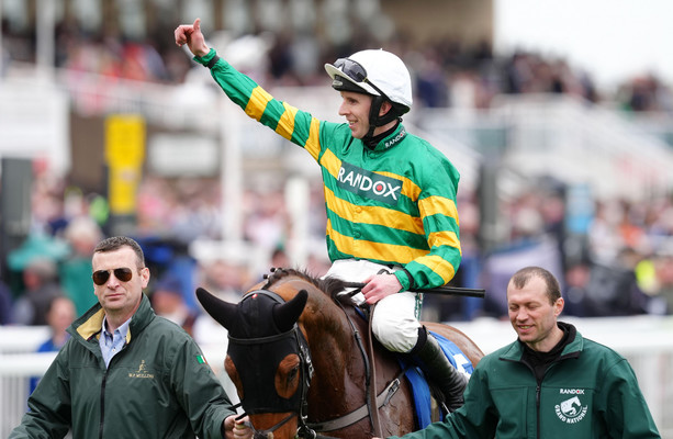 JP McManus strikes green and gold with Grade 1 treble at Aintree