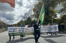 Anti-asylum seeker protesters march through Newtownmountkennedy chanting 'Newtown says no'