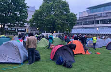 Trinity students set up encampment after accusing college of trying to 'scare' them into silence