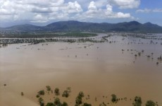 Queensland city facing further flood damage as waters continue to rise