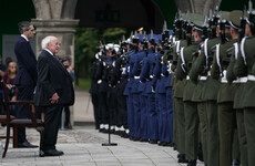President Higgins lays wreath at 'poignant' commemoration ceremony in Dublin