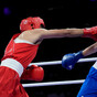 Algerian boxer in Olympic gender row wins in 46 seconds
