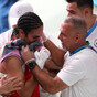 Olympics gender row boxer in tears after winning at least bronze
