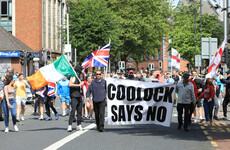 Coolock Says No banner greeted with anger at anti-migrant protest after Belfast loyalist march