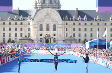 Former world record holder Kipchoge pulls up during marathon as Ethiopian Tola triumphs