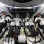 Four astronauts back on Earth after capsule trouble and hurricane delays