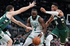 Champion Celtics defeat Bucks despite big night for 'child' Giannis Antetokounmpo