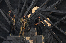 Syria rebels have reached suburbs of Damascus, says opposition as government denies withdrawing
