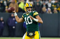 Love spreads his arms for 182 yards to send Green Bay to play-offs
