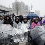 South Korean protesters brave cold to demand Yoon arrest as deadline looms