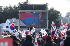 South Korea's impeached president in court as investigators seek to extend detention