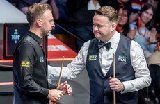 Judd Trump holds off spirited Shaun Murphy fightback to make Crucible last eight